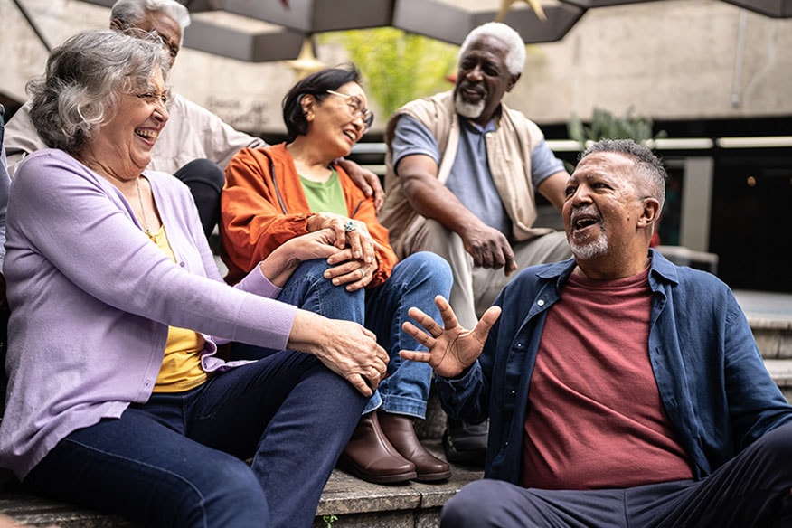 A group of people sitting on steps